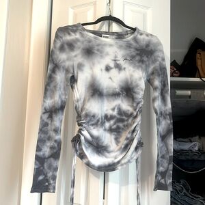 Pink long sleeve lounge wear top, like new condition, slimming sides.